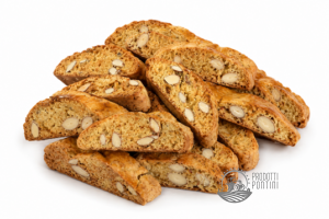 Pile of almond biscotti stacked on a white background, showing whole almonds in each slice.
